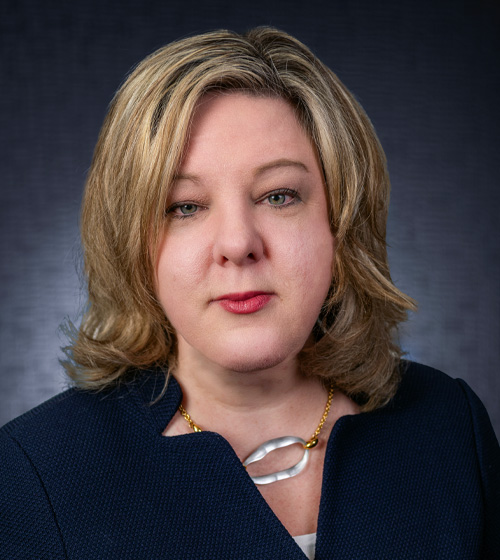 Headshot of Jaime N. Doherty, author of article regarding new protections for pregnant workers